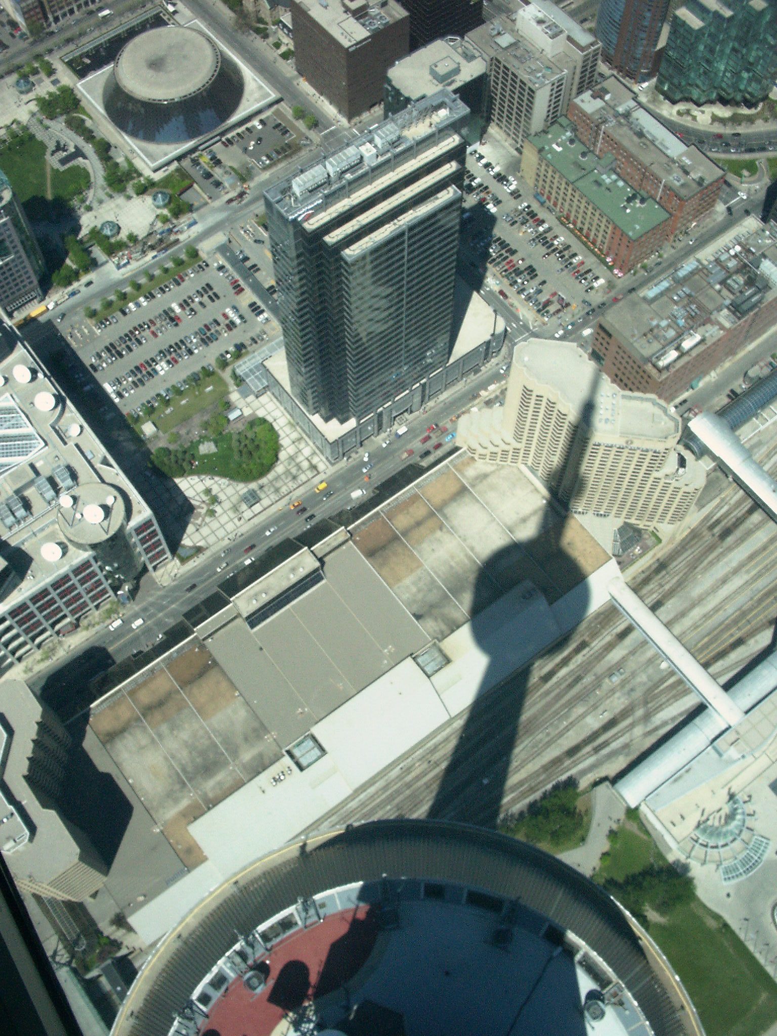 Looking out from an observation deck over the Toronto skyline and lake